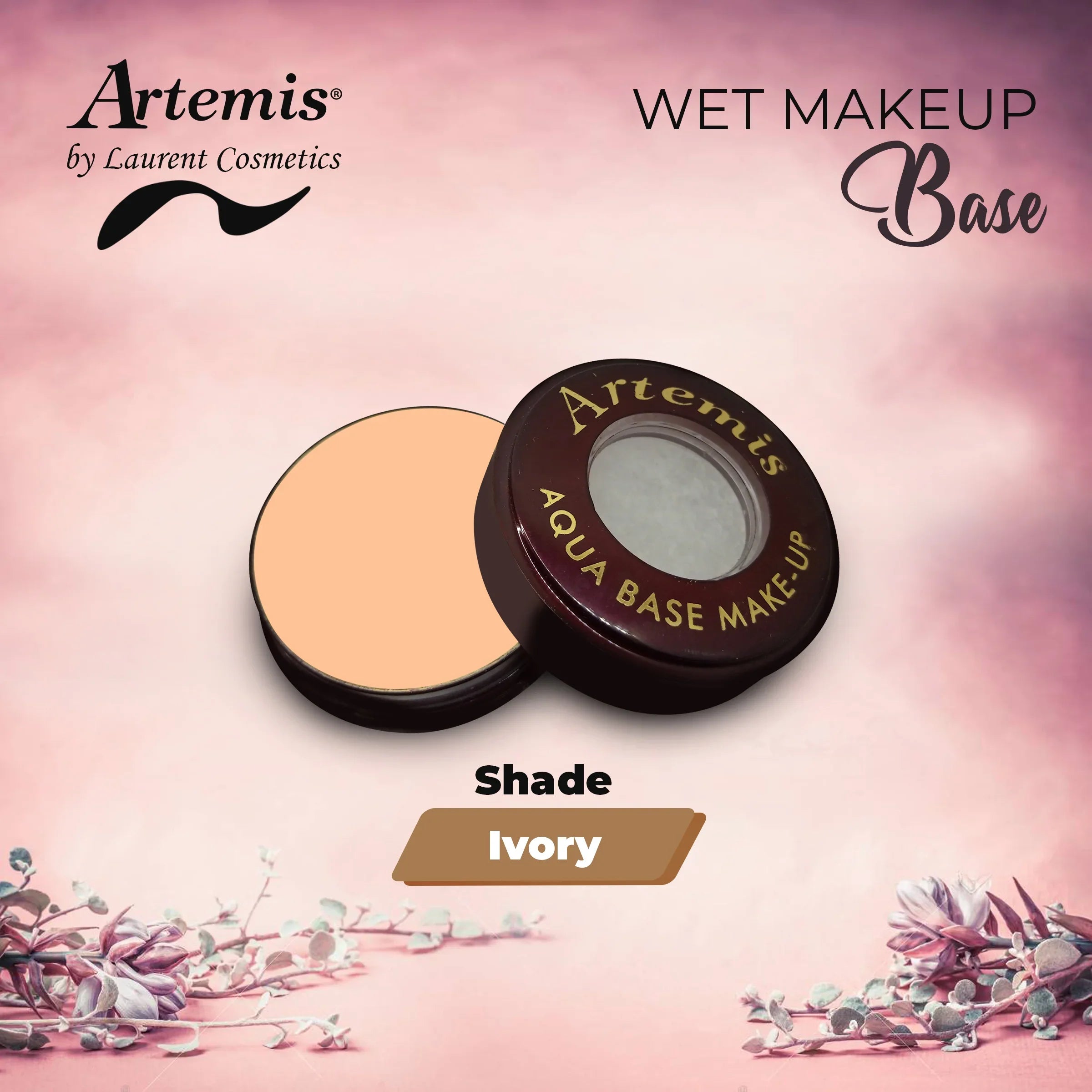 Artemis Aqua Base wet makeup in ivory shade, compact with open lid on a pink floral background.