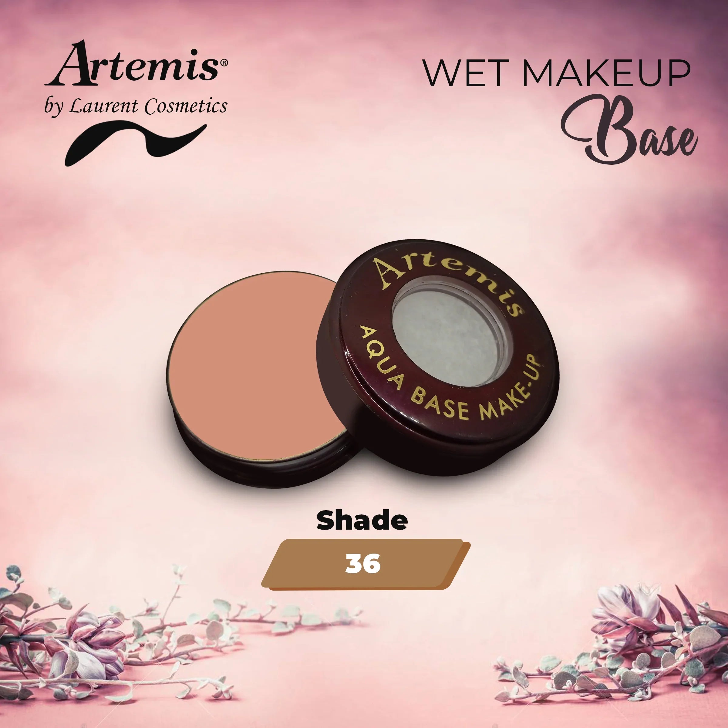 Open compact of Artemis aqua base makeup in shade 36 on a pink floral background.